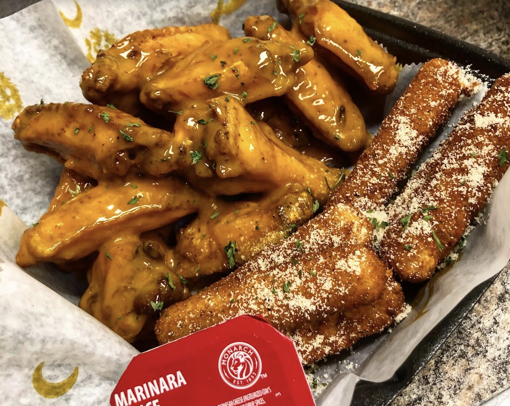 Lemon pepper wings with seasoned mozzarella sticks